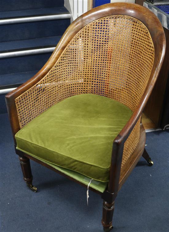 A Regency mahogany bergere library chair, W.1ft 11in. D.2ft 4in. H.3ft